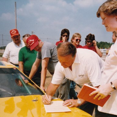 A J Foyt signing autographs at Columbus Motor Speedway, May 1988