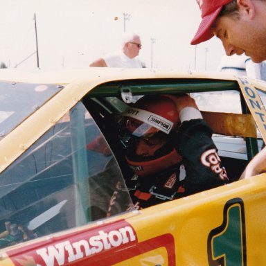 A J Foyt strapping in John Vallo's Backup Car, Columbus Motor Speedway, May 1988