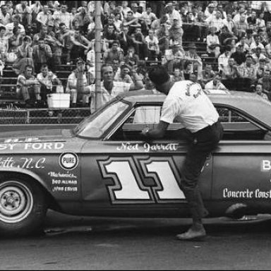 Ned Jarrett climbs in his office