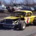 Cam Gagliardi yellow Corvair on pit road 1969