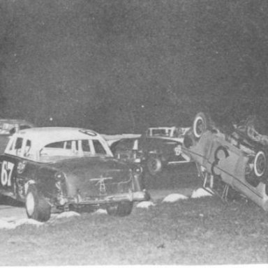 Early Model action from 1966 - Tom Gillis on his roof after tangling with Gene Tharpe 67 as Donnie Tanner 88 goes by__