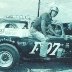 Red Farmer climbs from his Modified Special sedan at Birmingham in 1962
