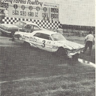 Junior Johnson crashed Roy Mayne squeezes through