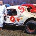 Chuck Boos posed with coupe