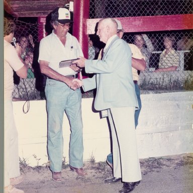 Zervakis receiving award from J.M.Wilkerson at Southside Speedway