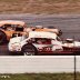 Charlie Jarzombek #1 and Richie Evans #61 race side by side