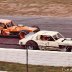 Richie Evans #61 takes the lead from Geoff Bodine #1.