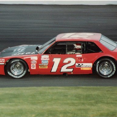Tommy Ellis in his beautiful Grand Am