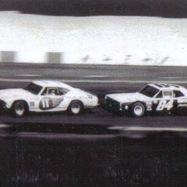 Ray Hendrick leading Darrell Waltrip