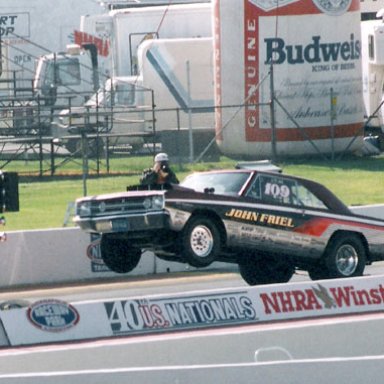 JOHN_FRIEL_SS_AA_WHEEL_STAND