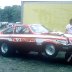 Tim Lysikowski working on car in pit 1974 photo by Todd Wingerter