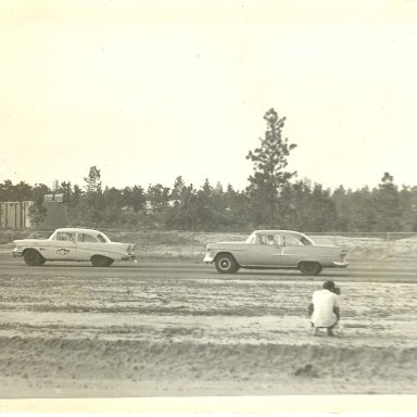 Jerry Martin in 57 cheverolet and Ernest Dinkins in 55 Chevrolet in run made at Augusta International Speedway