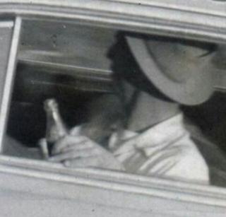1. Herb Thomas holding Coke or Pepsi Bottle.JPG
