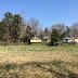 Spring 2021 Backstretch looking toward Start Finish on left and yellow house on right is in turn four jpg.jpg