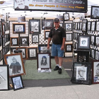 Mike W. Smith with some of his art work