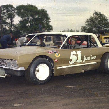 George Fisher Sr in car in pits 1969 TRIBUTE CAR TO HIS SON LOST IN VIETNAM
