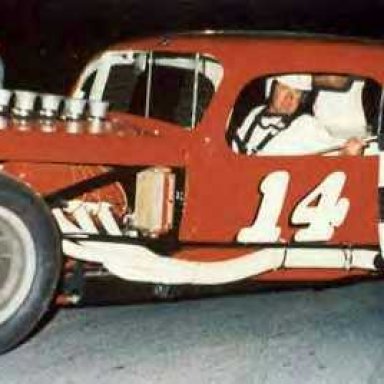 Richie Massing in the Dick Barney #14 sedan, John Grady photo