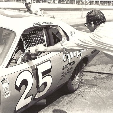 Pit Stop.  Jabe Thomas handing dad water.