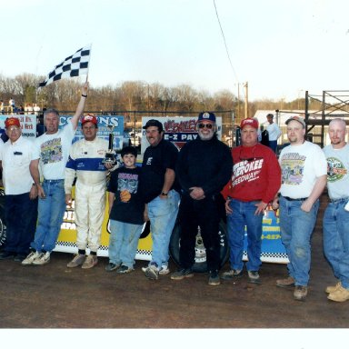 IT TAKES THE ENTIRE CREW TO RECEIVE THE CHECKERED FLAG 1990S