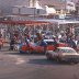 #18 Joe Fasson waits as Petty's crew pushes car back to garage after 1976 Daytona 500