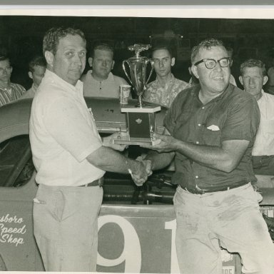 Promoter Zervakis giving Hutchins trophy at Southside Speedway