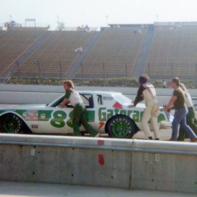 Darrell Waltrip's Gatorade #88 being pushed to qualify