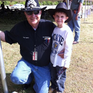 Tim Leeming and boy in matching cowboy hats