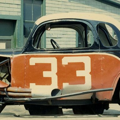 Dave's hot rod in front of the old Main Street shop. DeCarr collection photo.