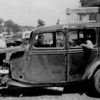 1956 State Fair car with Al sitting over the rear end. Check out the fruit juice cans soldered together for the exhaust, and the Denver heads