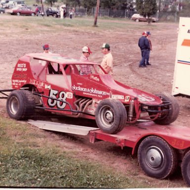 Merv on trailer Troyer car