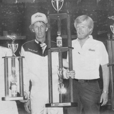 Spider collecting his championship trohy in '84 with Aubrey Fishel to his right and Jimmy Johnson to his left.