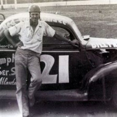 Bill France with one of Raymond Parks' 39' Fords. Circa 1940