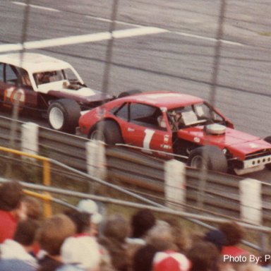 Geoff Bodine #1 tries to hold off a charging Eddie Flemke #10