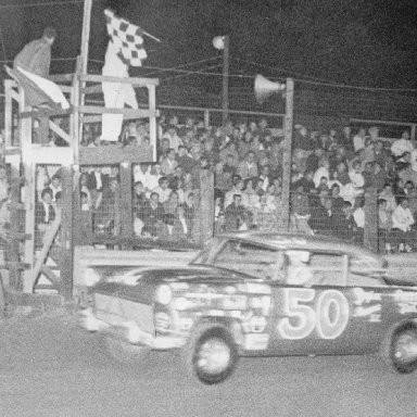 Slick Gibbons Takes Checkered Flag after winning race at Sumter Speedway.