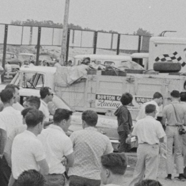 Jarrett leaning against hauler Bridgehampton 1963