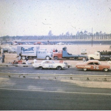 Burton & Robinson #36 driven by Larry Thomas Nov '64 with Ramp Truck in background nose to nose with Petty truck