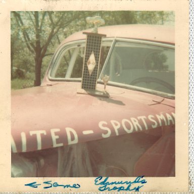 Fred Ray Coupe with trophy