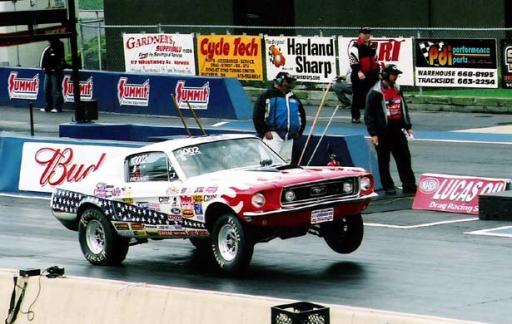 DOUG_BAKER_B_SA_WHEELS_UP - Gallery - Tom Kasch | racersreunion.com