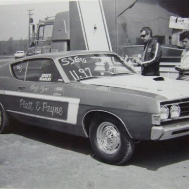 Randy Payne in the Platt & Payne clinic car photo by Todd Wingerter