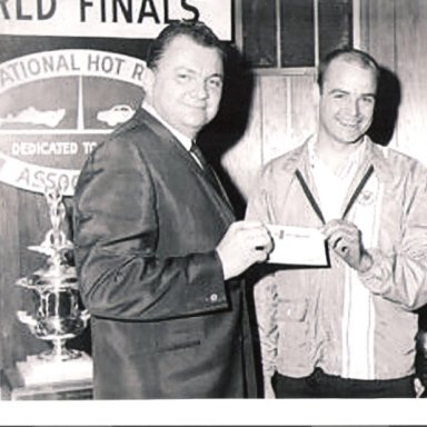 Ed collecting the big check -1967 NHRA SS Champion