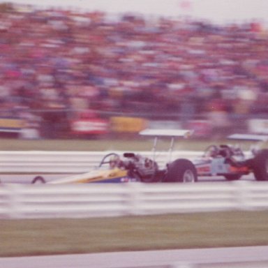 two Dragsters at Speed 1974 Indy