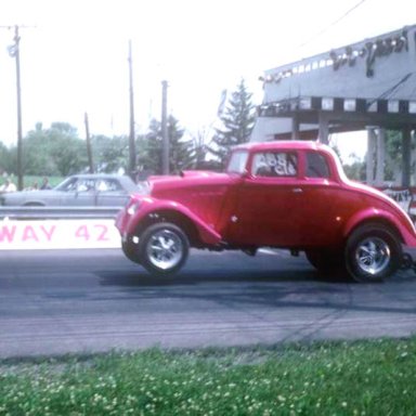 Dennis Furmanchik C-G 33 Willys coming of Dragway 42 1969  photo by Todd Wingerter