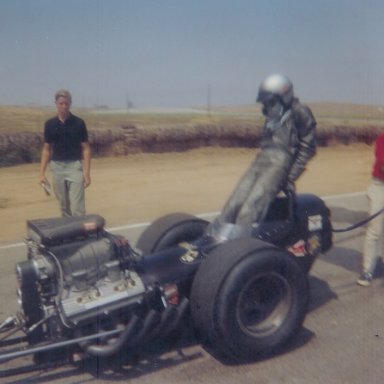 Danny Ongais getting out of the "Mangler" top fuel dragster at 1965 HRM Championships