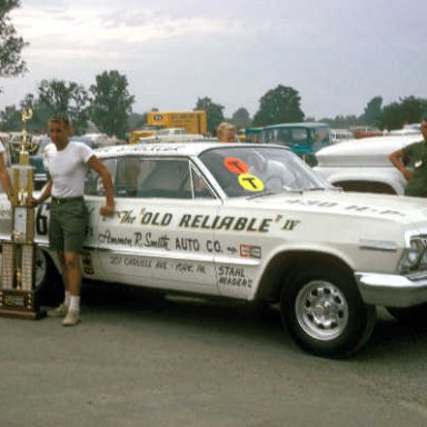 Z11-The Old Reliable IV and the 1963 NHRA A/FX & Little Eliminator Trophy, the mags wheels were removed when the picture with Bill Jenkins was taken.