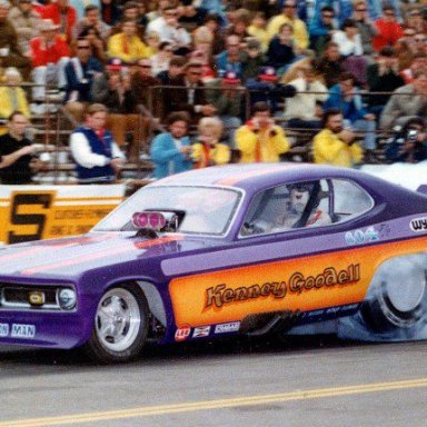ACTION MAN KENNEY GOODELL SMOKIN THE TIRES IN HIS DUSTER